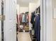 Walk-in closet with ample storage space and organized shelving at 6738 Brookfield Way, Douglasville, GA 30134