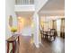 Inviting foyer with hardwood floors leading to the dining area and staircase at 6738 Brookfield Way, Douglasville, GA 30134