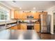Bright kitchen featuring modern appliances, ample counter space and stainless steel refrigerator at 6738 Brookfield Way, Douglasville, GA 30134