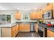 Well-equipped kitchen featuring stainless steel appliances and ample counter space at 6738 Brookfield Way, Douglasville, GA 30134