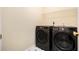 Laundry room with modern washer and dryer at 6738 Brookfield Way, Douglasville, GA 30134