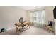Office with natural light, wooden desk and ergonomic chair at 6738 Brookfield Way, Douglasville, GA 30134