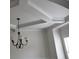 Dining room with decorative ceiling trim and chandelier at 1365 Slate Bend Dr, Dacula, GA 30019