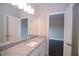 Bathroom with granite countertops and access to the bedroom provides convenience at 14 Berkten Ct, Hiram, GA 30141