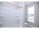 Bathroom features shower and tub combo and window for natural light at 14 Berkten Ct, Hiram, GA 30141