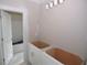 Bathroom featuring vanity cabinets with open access to a tub and shower at 14 Berkten Ct, Hiram, GA 30141