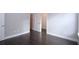 Spacious bedroom features beautiful hardwood floors, neutral paint, and walk-in closet at 14 Berkten Ct, Hiram, GA 30141