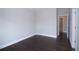 Bedroom with hardwood floors and neutral paint is ready for personalization at 14 Berkten Ct, Hiram, GA 30141