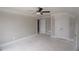 Unfinished bedroom boasting a ceiling fan and closet doors, offering a blank canvas for personalization at 14 Berkten Ct, Hiram, GA 30141