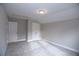 Neutral bedroom with plush carpeting, closet, and a pair of matching doors at 14 Berkten Ct, Hiram, GA 30141