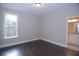 Bedroom with hardwood floors and bathroom with granite countertops at 14 Berkten Ct, Hiram, GA 30141