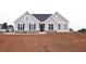 Charming gray house with black shutters, stone accents, and landscaping at 14 Berkten Ct, Hiram, GA 30141
