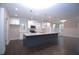 Spacious kitchen with a large island, granite countertops, and ample cabinet space at 14 Berkten Ct, Hiram, GA 30141