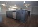 Kitchen island with stainless steel dishwasher and granite countertops at 14 Berkten Ct, Hiram, GA 30141