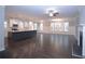 Open-concept kitchen featuring a large island, white cabinets, and stainless steel appliances at 14 Berkten Ct, Hiram, GA 30141