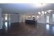 Spacious living room open to kitchen with hardwood floors and lots of natural light at 14 Berkten Ct, Hiram, GA 30141