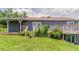 Home backyard with a wooden porch and stair access at 3217 Canterbury Trl, Rex, GA 30273