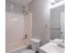 Cozy bathroom features a tub and shower combo and a new vanity with modern lighting at 3217 Canterbury Trl, Rex, GA 30273