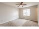 Bedroom featuring neutral paint, carpeting, and a ceiling fan with light at 3217 Canterbury Trl, Rex, GA 30273