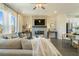 Bright living room featuring a modern fireplace, stylish furniture, and natural light at 6137 Wayburn St, Tucker, GA 30084