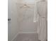 Walk-in closet with a hanger, plenty of space, and a soft carpet at 6137 Wayburn St, Tucker, GA 30084
