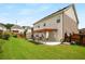 Enjoy the large backyard with a covered patio perfect for outdoor dining and entertaining guests at 872 Misty View Ct, Lilburn, GA 30047