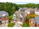 Beautiful two-story home featuring brick and siding, a manicured lawn, and an attached two-car garage at 872 Misty View Ct, Lilburn, GA 30047