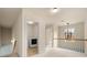 Second floor hallway features a laundry closet, and a light-filled stairwell at 872 Misty View Ct, Lilburn, GA 30047