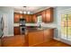 Cozy kitchen with granite countertops, stainless steel appliances, and hardwood floors at 872 Misty View Ct, Lilburn, GA 30047