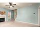 Bright living room features a fireplace and neutral decor at 872 Misty View Ct, Lilburn, GA 30047