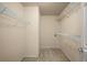 Walk-in closet with shelving providing lots of storage space at 872 Misty View Ct, Lilburn, GA 30047