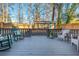 Relaxing back deck with rocking chairs, overlooking the backyard at 1555 Steele Nw Dr, Atlanta, GA 30309