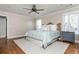 Bright bedroom with hardwood floors, ceiling fan and neutral-colored walls at 1555 Steele Nw Dr, Atlanta, GA 30309