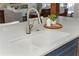 Kitchen sink area with white countertops and a modern faucet at 1555 Steele Nw Dr, Atlanta, GA 30309