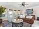 Cozy living room with French doors, accent furniture and a stylish area rug at 1555 Steele Nw Dr, Atlanta, GA 30309