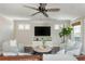 Bright living room featuring neutral walls, a ceiling fan and stylish furniture at 1555 Steele Nw Dr, Atlanta, GA 30309