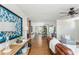 Open-concept living room with hardwood floors and stylish furnishings at 1555 Steele Nw Dr, Atlanta, GA 30309