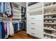 Organized walk-in closet featuring custom shelving, drawers, and ample storage space at 1555 Steele Nw Dr, Atlanta, GA 30309