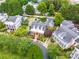 Aerial view showcasing the property nestled among lush greenery in a desirable neighborhood at 3786 Turnberry Ct, Duluth, GA 30096