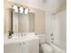 Bright bathroom featuring white vanity and a large mirror with vanity lighting at 3786 Turnberry Ct, Duluth, GA 30096