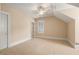Cozy bedroom with a ceiling fan, window with bright light, and neutral carpet at 3786 Turnberry Ct, Duluth, GA 30096