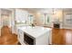 Spacious kitchen island and open concept to living room at 3786 Turnberry Ct, Duluth, GA 30096