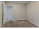 Empty bedroom with neutral walls and adjacent bathroom at 5073 Leland Dr, Stone Mountain, GA 30083