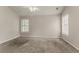 Empty bedroom with neutral walls, carpet flooring and natural light at 5073 Leland Dr, Stone Mountain, GA 30083
