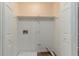 A small, empty closet, ready for customization at 5073 Leland Dr, Stone Mountain, GA 30083