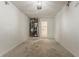A spacious one-car garage with white walls and concrete floor at 5073 Leland Dr, Stone Mountain, GA 30083