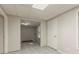 A potential bonus space with gray walls, access to an adjacent room, and exterior access at 5073 Leland Dr, Stone Mountain, GA 30083