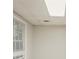 Neutral room with a window and a grid ceiling at 5073 Leland Dr, Stone Mountain, GA 30083