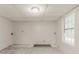 Unfinished room with gray walls and a window, waiting for your personal touches at 5073 Leland Dr, Stone Mountain, GA 30083