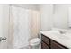 Cozy bathroom with shower featuring patterned shower curtain at 7644 Rudder Cir, Fairburn, GA 30213